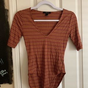 Stripped mid sleeve body suit